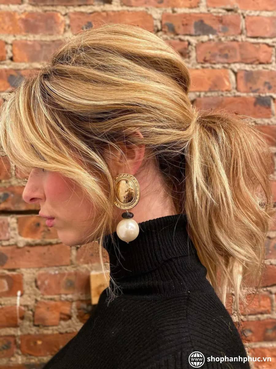 Low Ponytail with Curtain Bangs