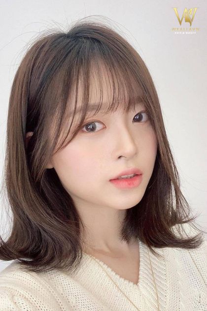 Tóc mái thưa cho mặt tròn