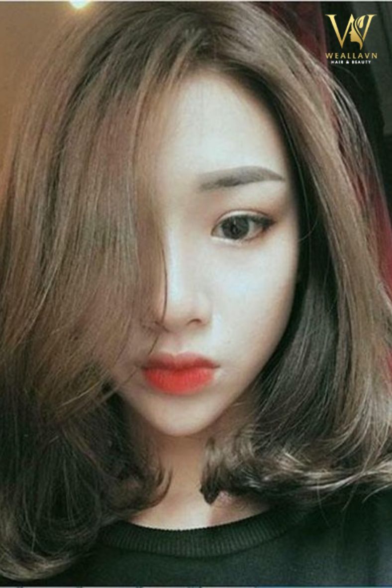 Tóc ngang vai uốn phồng