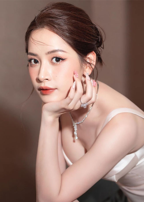 Top 9+ Kiểu Tóc Của Chi Pu Với Phong Cách Dịu Dàng và Quyến Rũ Chipu với kiểu tóc búi thấp